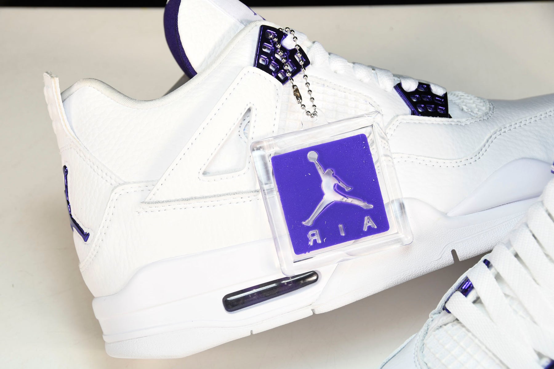 Air Jordan 4 Retro Metallic Purple